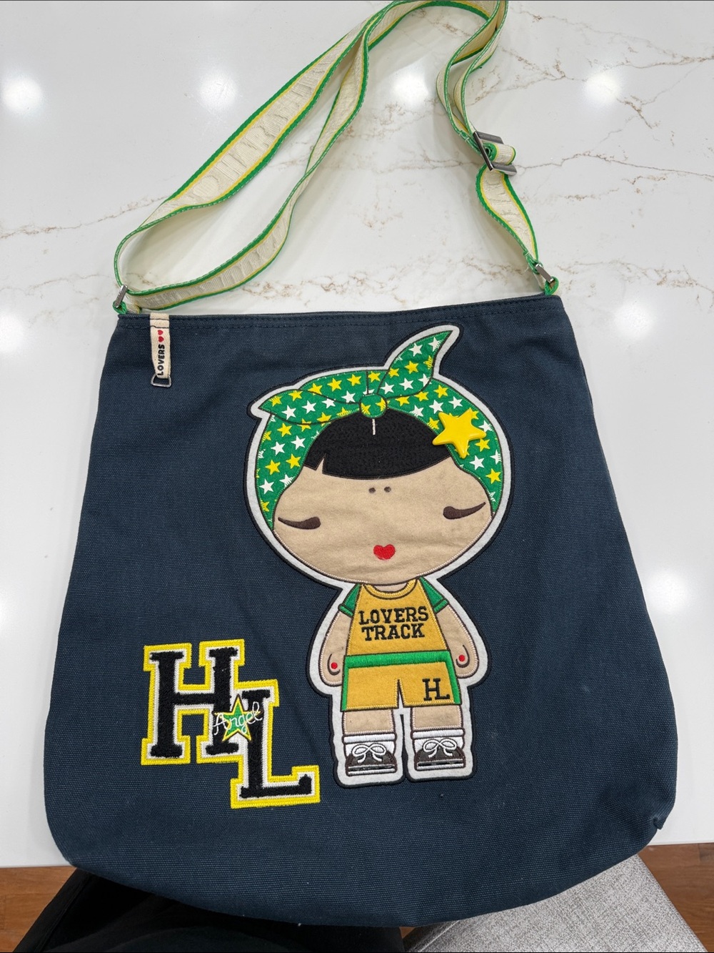 Harajuku Lovers Navy Crossbody Bag with Green and Yellow Accents